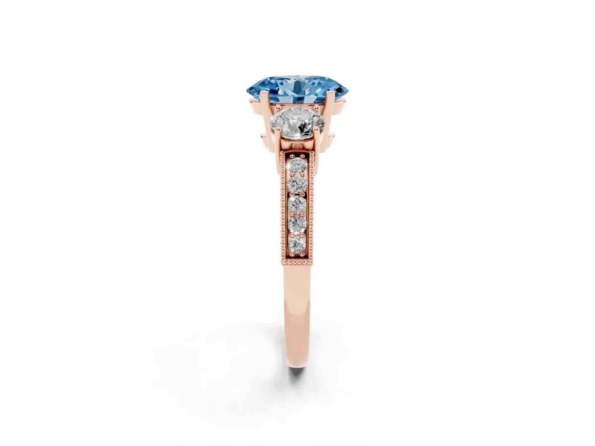 Fancy Blue Oval Cut Three-Stone Diamond Ring with Pavé Band and Four-Prong Setting Rose gold