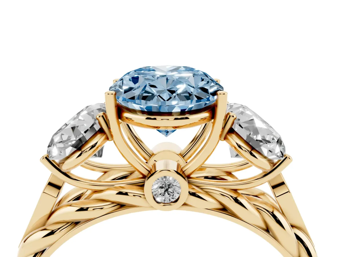 Fancy Blue Three-Stone Oval Cut Diamond Braided Band Ring with Four-Prong Setting Yellow gold