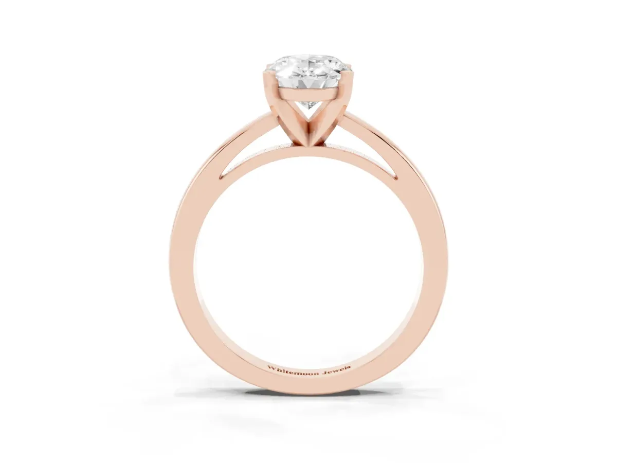 Oval Cut Solitaire Diamond Engagement Ring with Four-Prong Setting on a Classic Band Rose gold