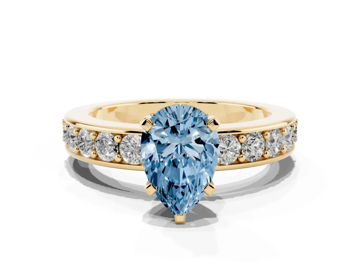 Fancy Blue Pear Cut Diamond Engagement Ring with Channel Set Round Band and Prong Setting Yellow gold