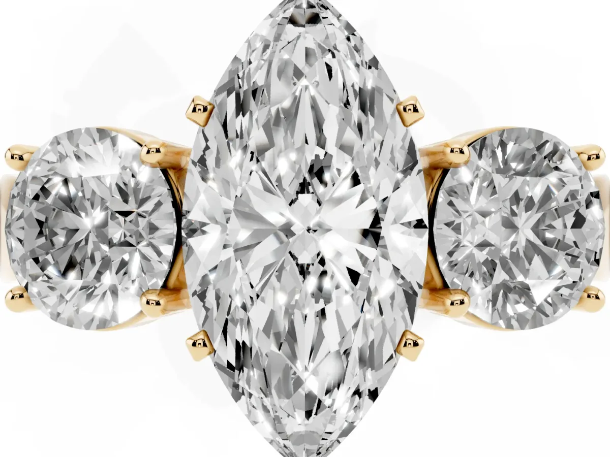 Three-Stone Marquise Cut Diamond Ring with Round Side Stones, Classic Band, and Four-Prong Setting Yellow gold