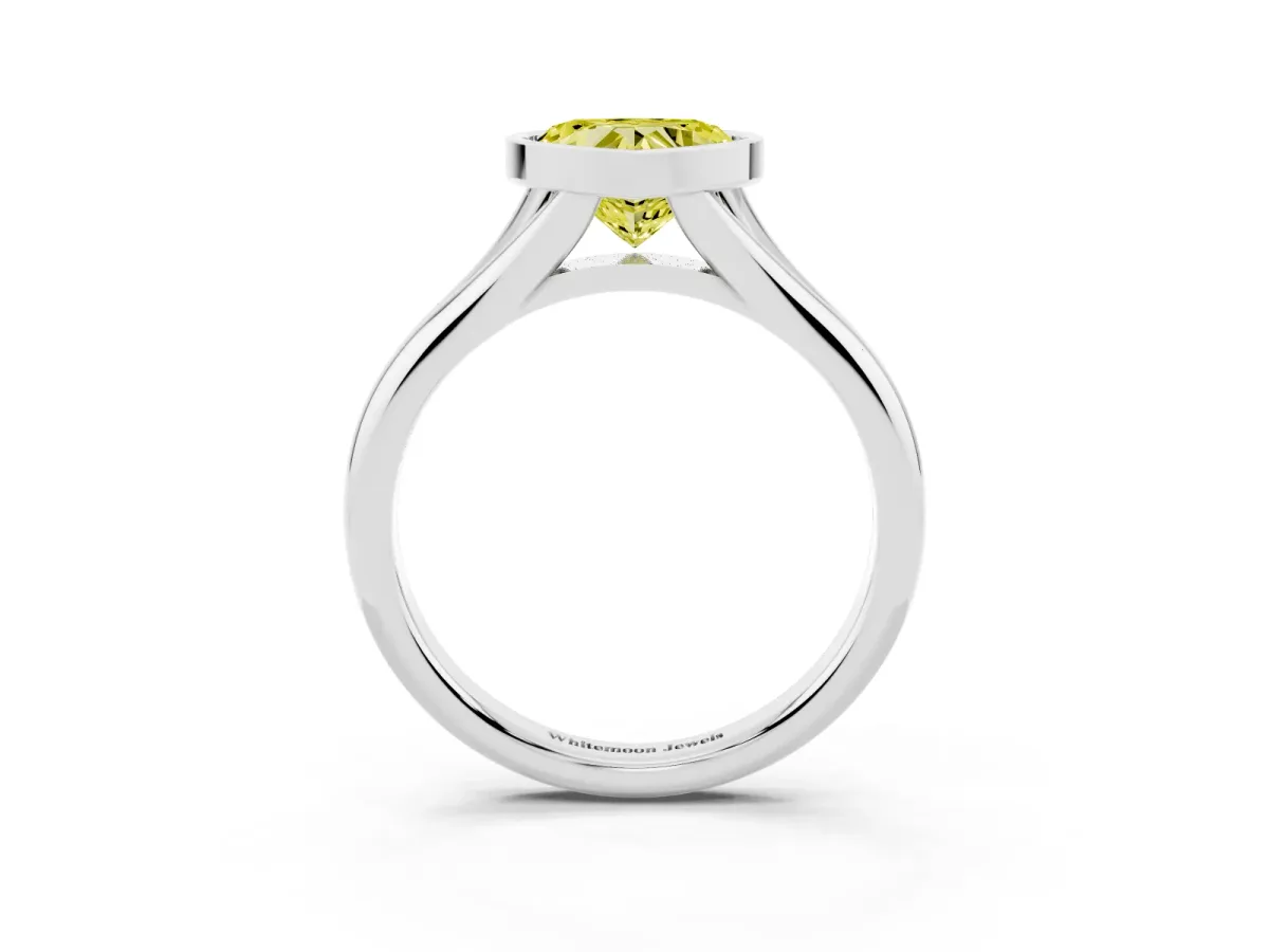 Fancy Yellow Bezel Set Heart Cut Solitaire Diamond Ring with Smooth Band Silver