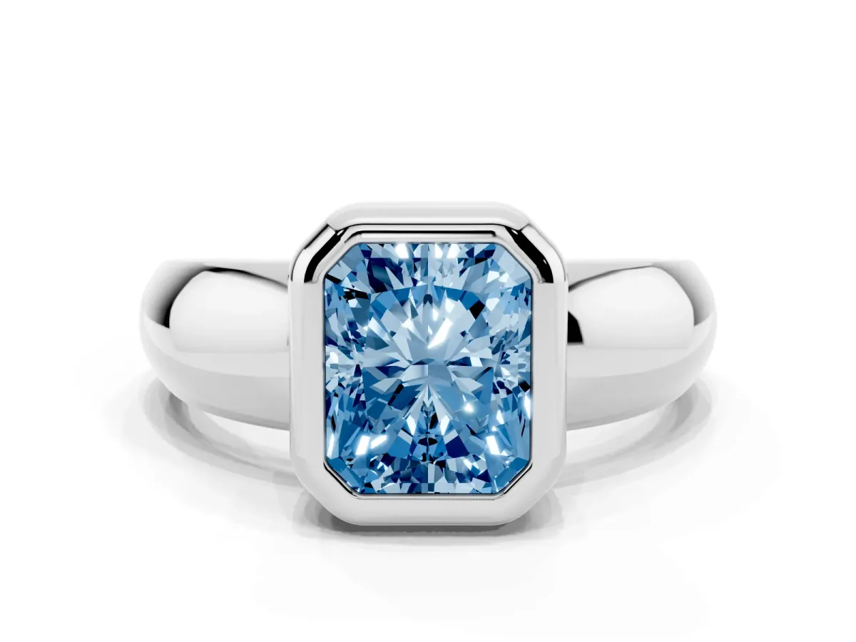 Fancy Blue Bezel Set Radiant Cut Solitaire Ring with Wide Band Silver