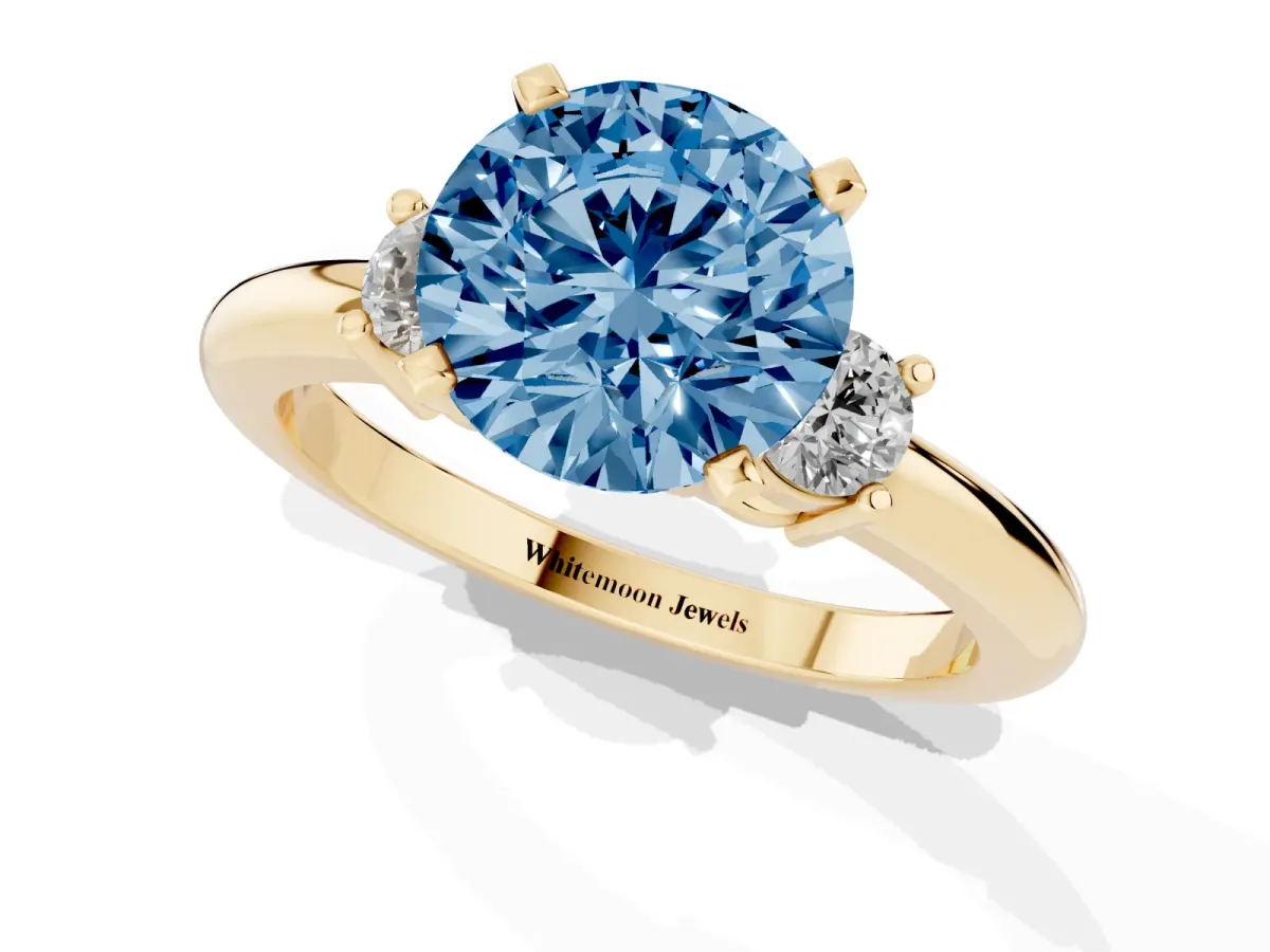 Fancy Blue Three-Stone Round Cut Cut Diamond Solitaire with Prong Setting and Classic Band Yellow gold