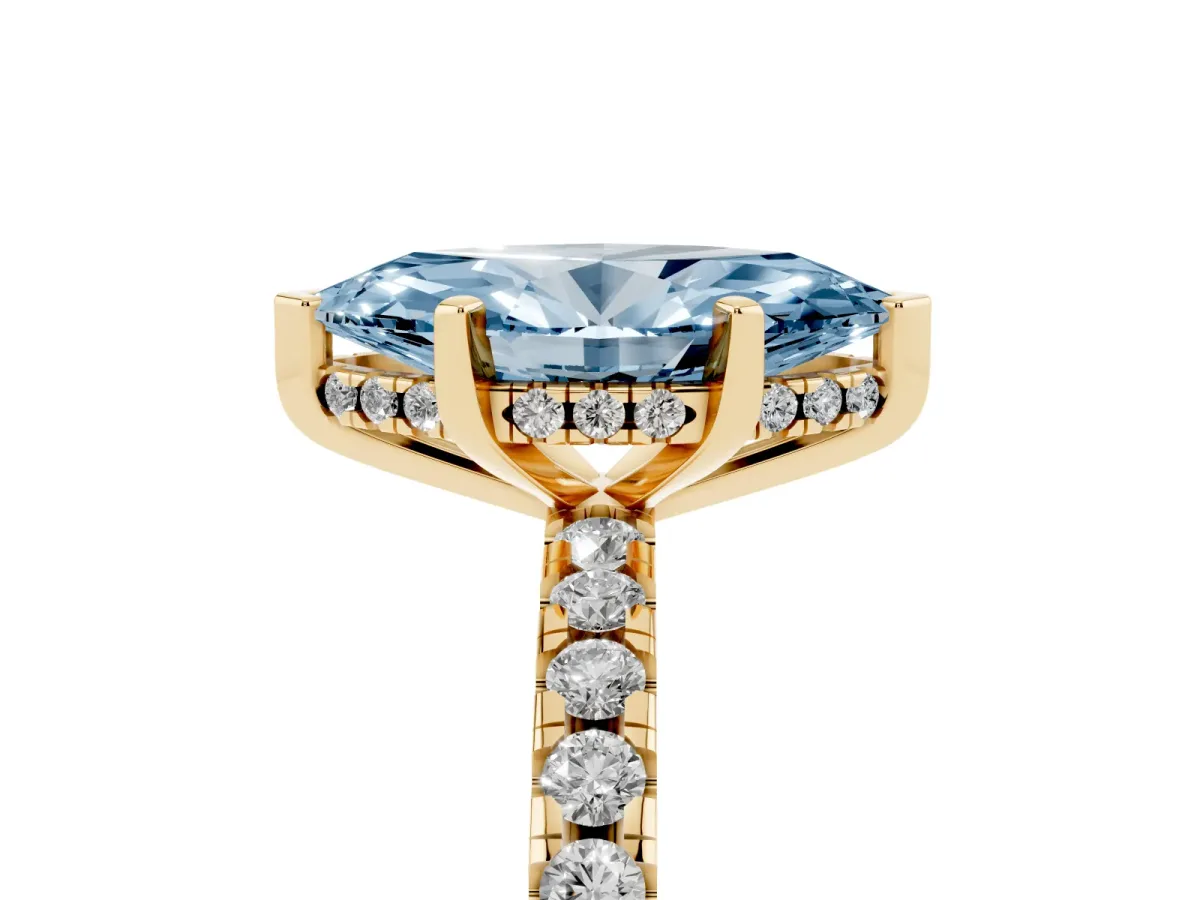 Fancy Blue Marquise Cut Diamond Solitaire Ring with Round Pavé Band and Four-Prong Setting Yellow gold