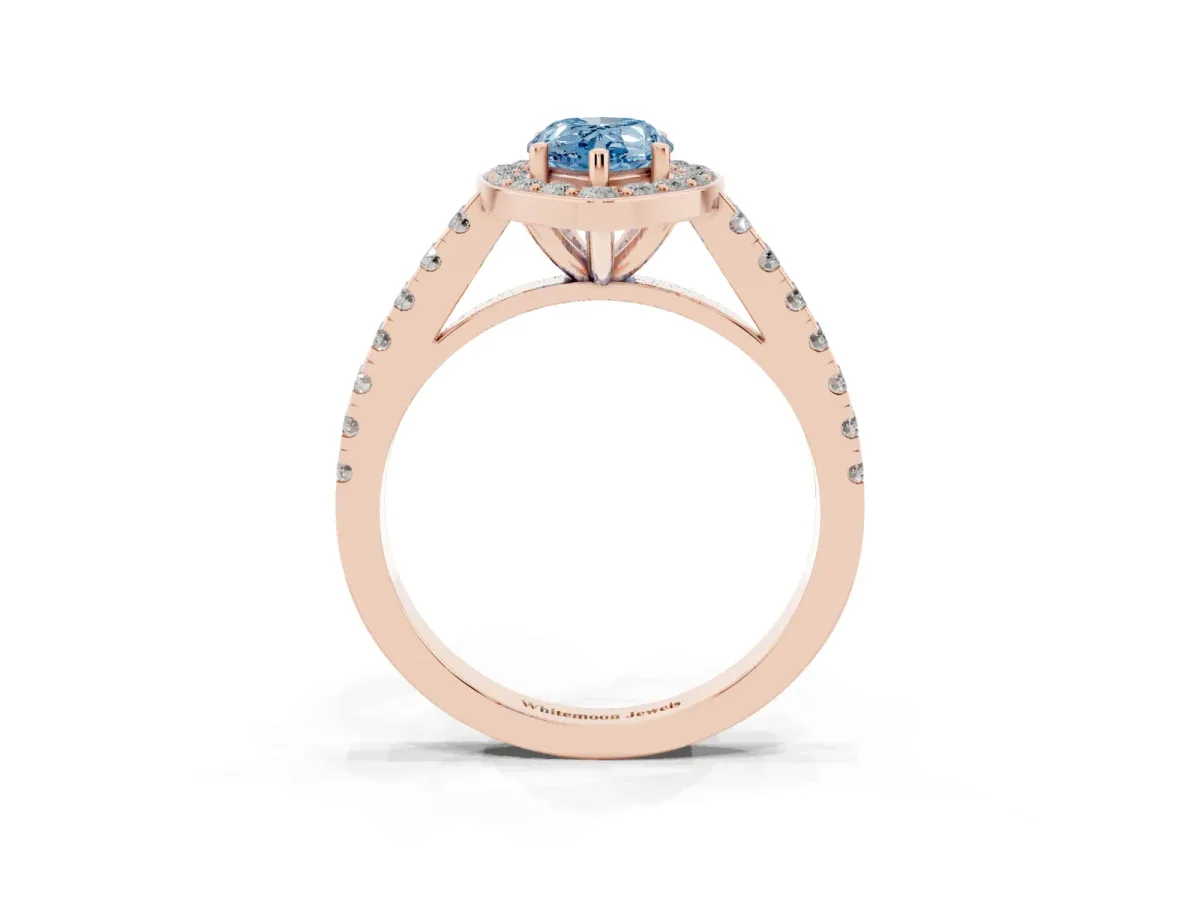 Fancy Blue Pear Cut Diamond Halo Ring with Round Pavé Split Shank and Prong Setting Rose gold