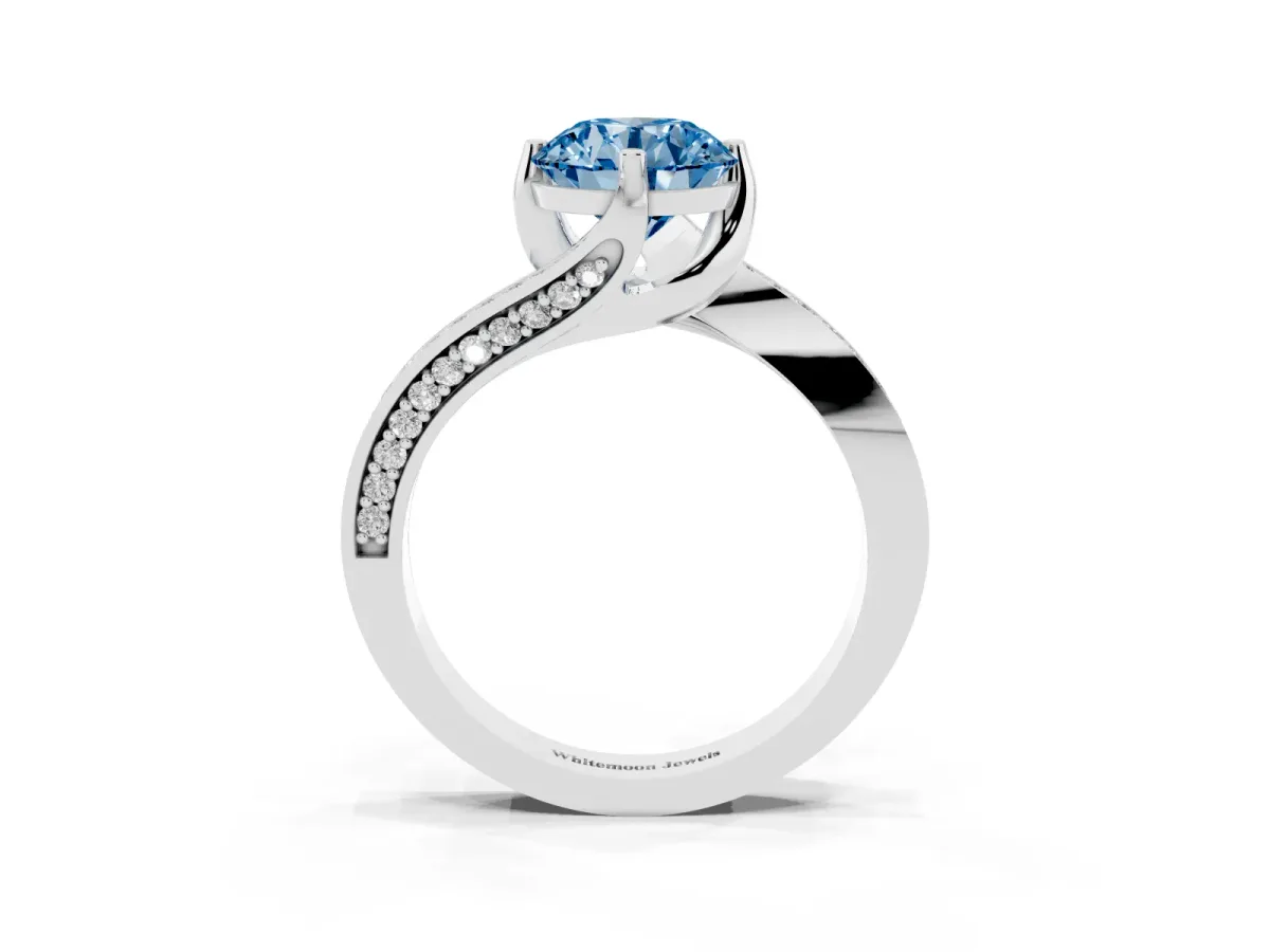 Fancy Blue Round Cut Solitaire Diamond Twist Band with Pavé Setting and Four-Prong Setting Silver