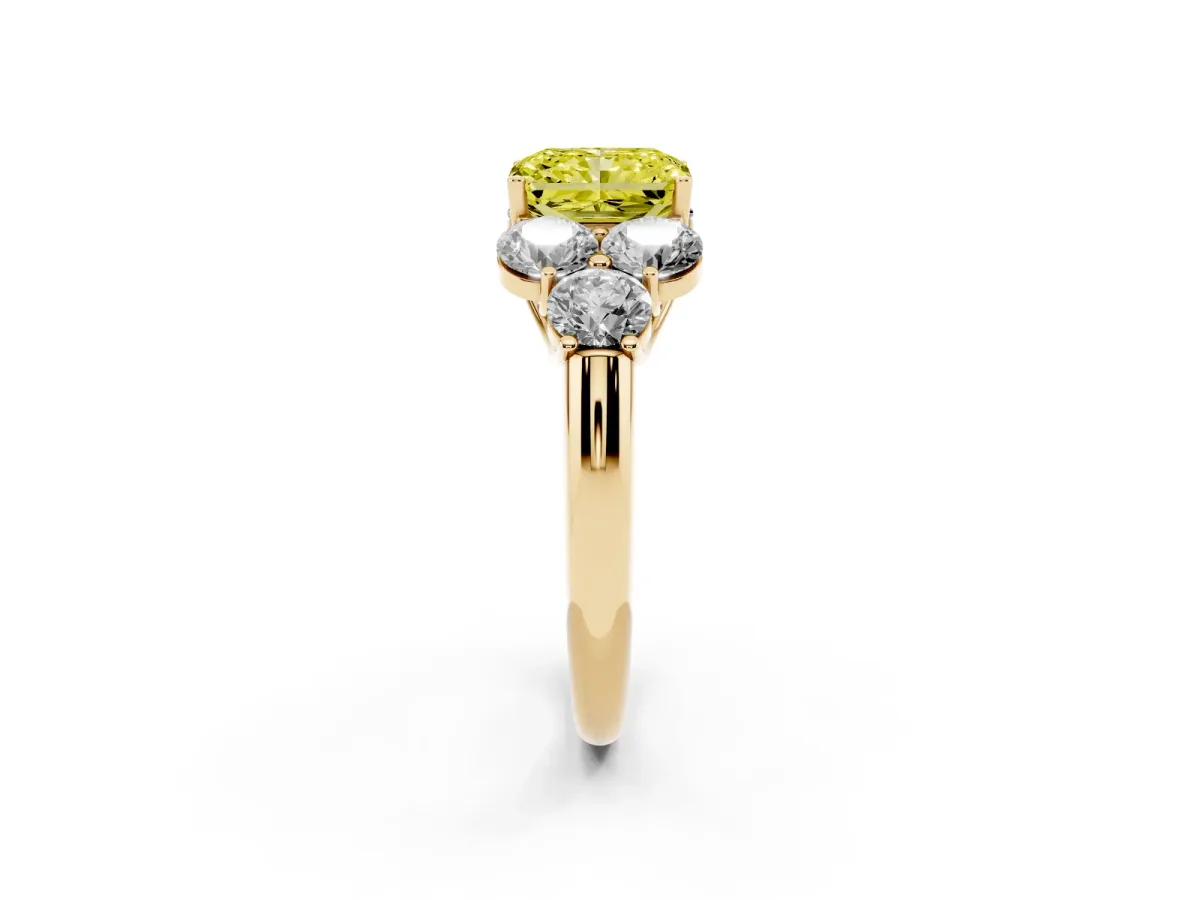 Fancy Yellow Radiant Cut Cut Diamond Cluster Ring with Round Accent Stones and Prong Setting on a Classic Band Yellow gold
