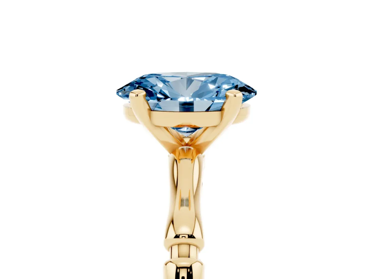 Fancy Blue Oval Cut Solitaire Diamond Ring with Bamboo Band and Four-Prong Setting Yellow gold