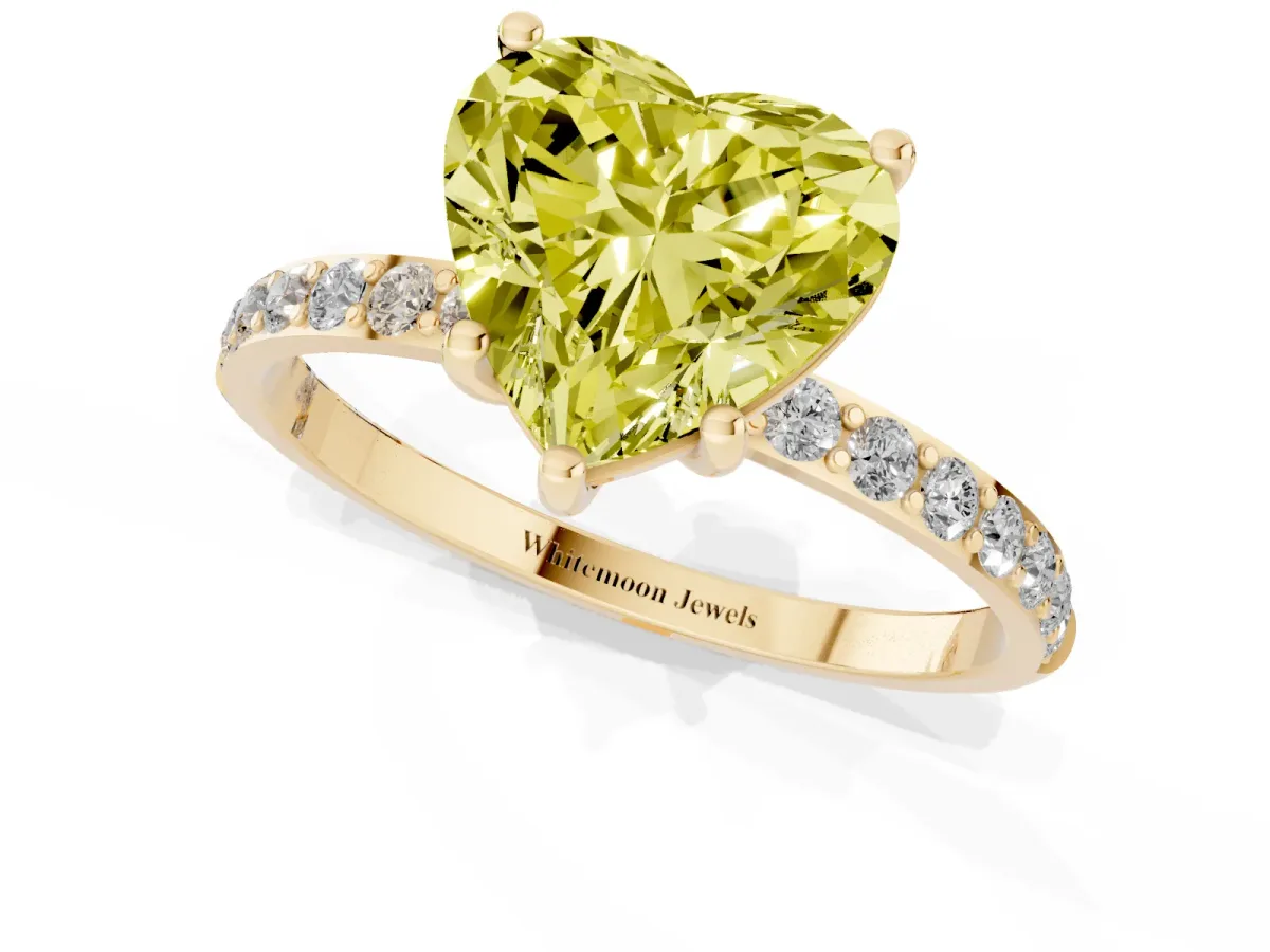 Fancy Yellow Heart Cut Diamond Solitaire Ring with Round Pavé Shoulders and Prong Setting Yellow gold