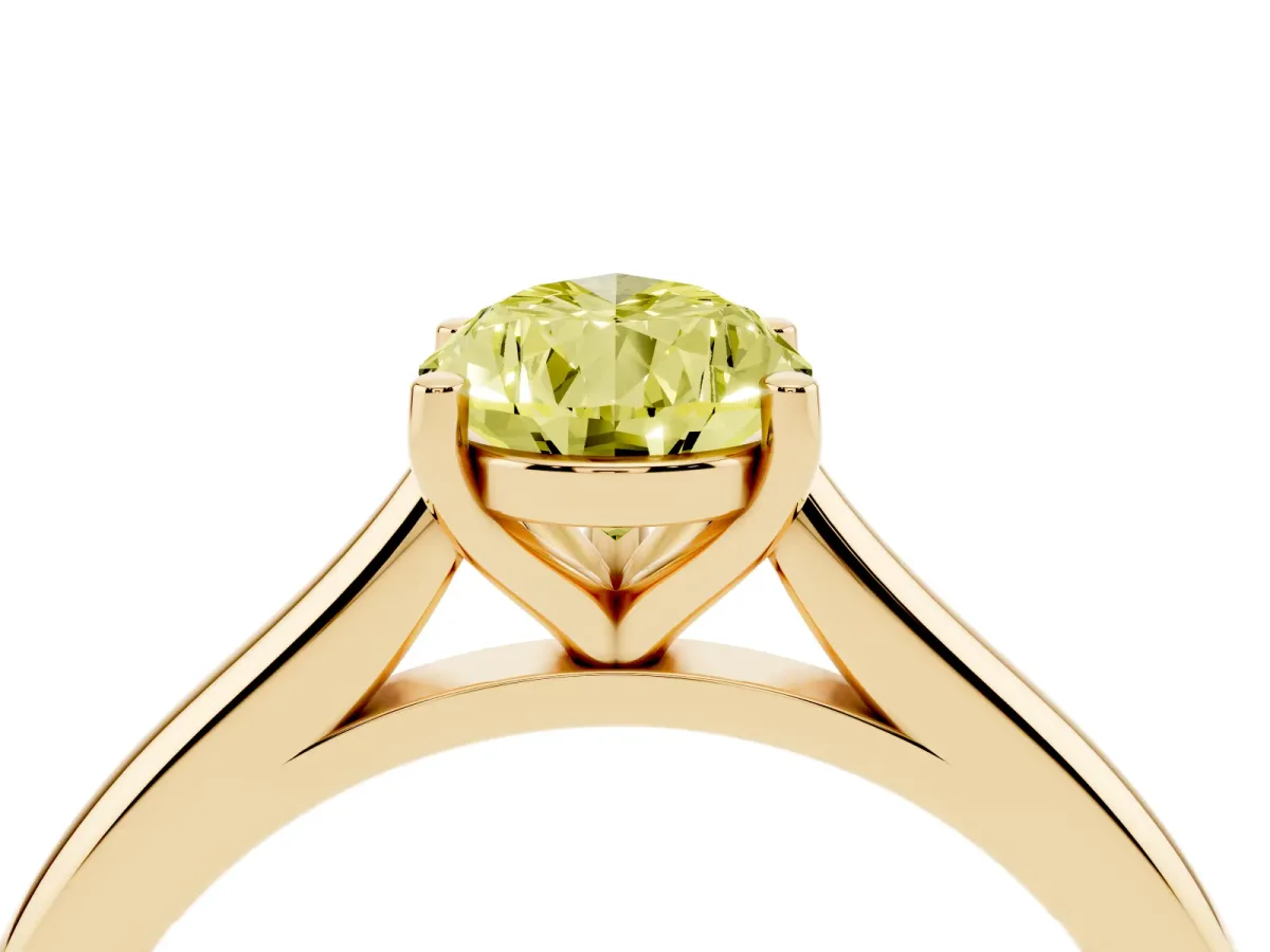Fancy Yellow Pear Cut Cut Solitaire Ring with Cathedral Band and Four-Prong Setting Yellow gold