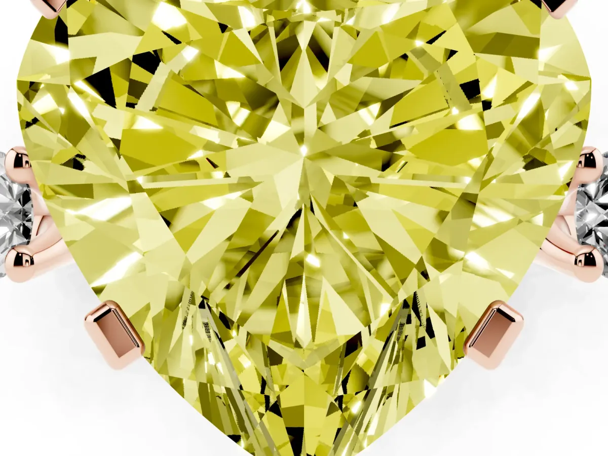 Fancy Yellow Heart Cut Cut Three-Stone Solitaire Ring with Round Accent Diamonds and Four-Prong Setting Rose gold