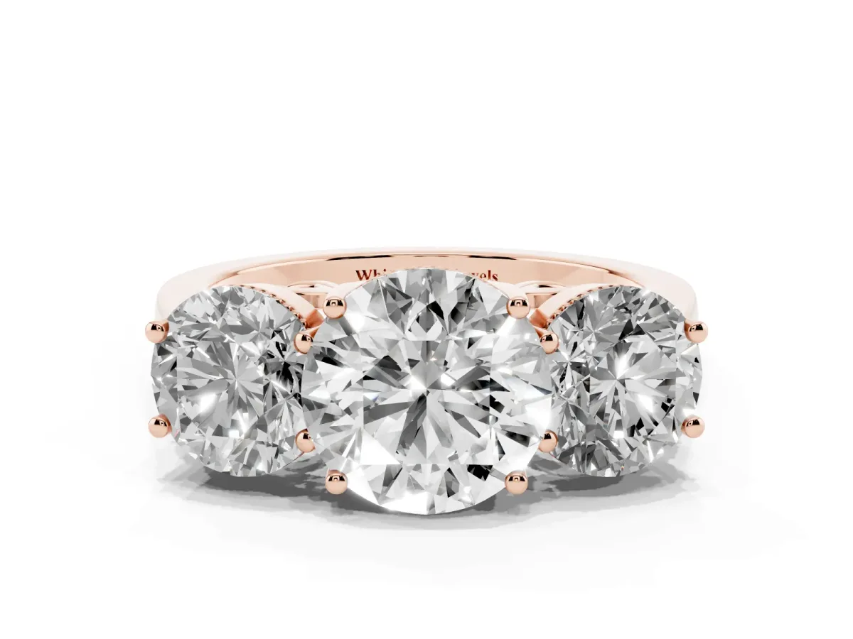 Three-Stone Round Cut Diamond Engagement Ring with Prong Setting on a Classic Band Rose gold