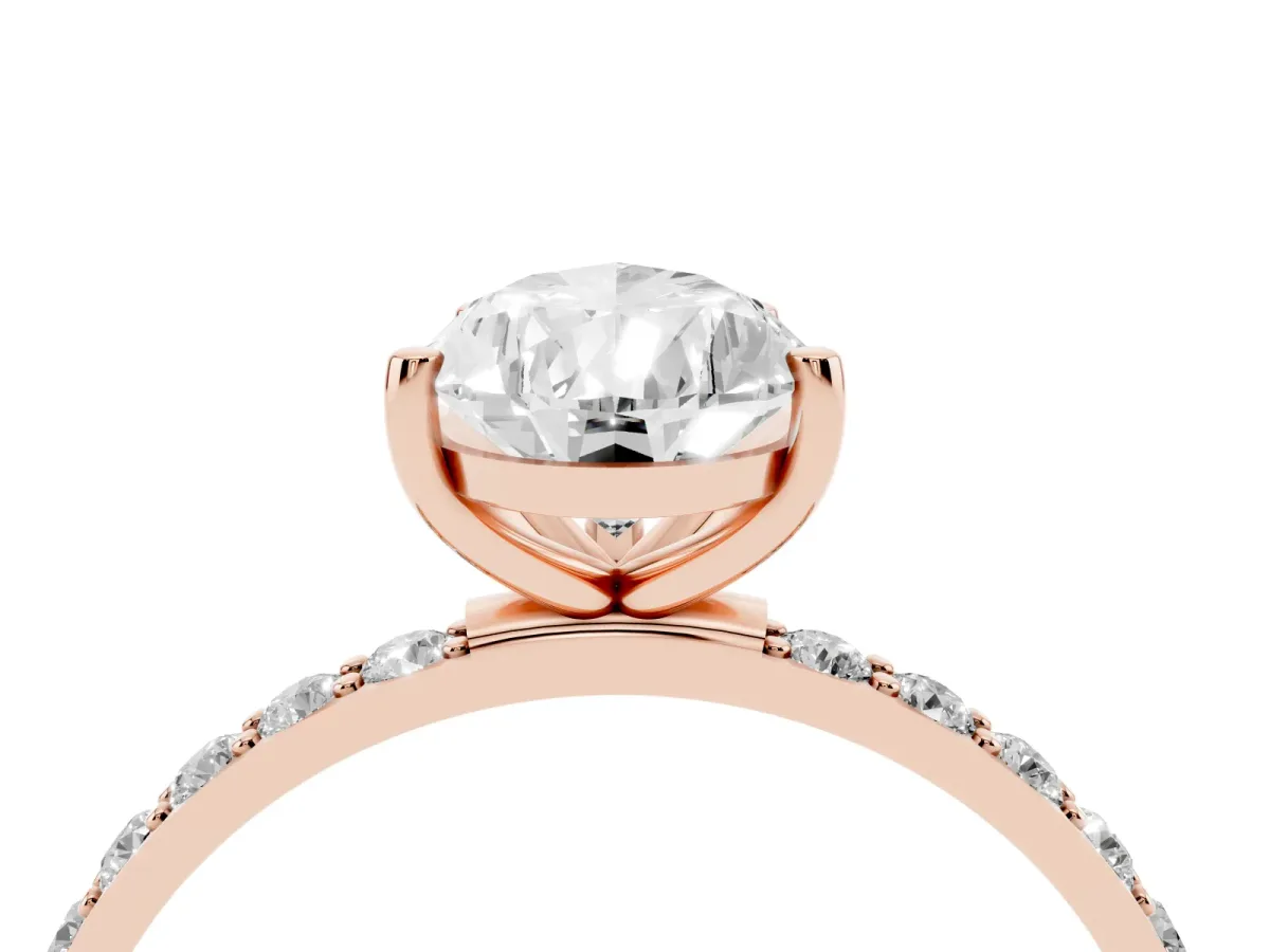 Pear Cut Diamond Solitaire Ring with Round Pavé Shoulders and Prong Setting Rose gold