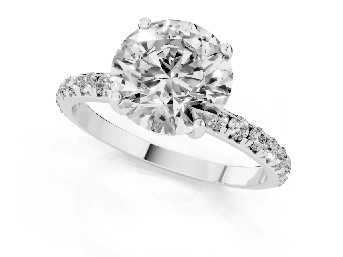 Round Cut Cut Diamond Solitaire Ring with Micro Pave Band and Four Prong Setting Silver