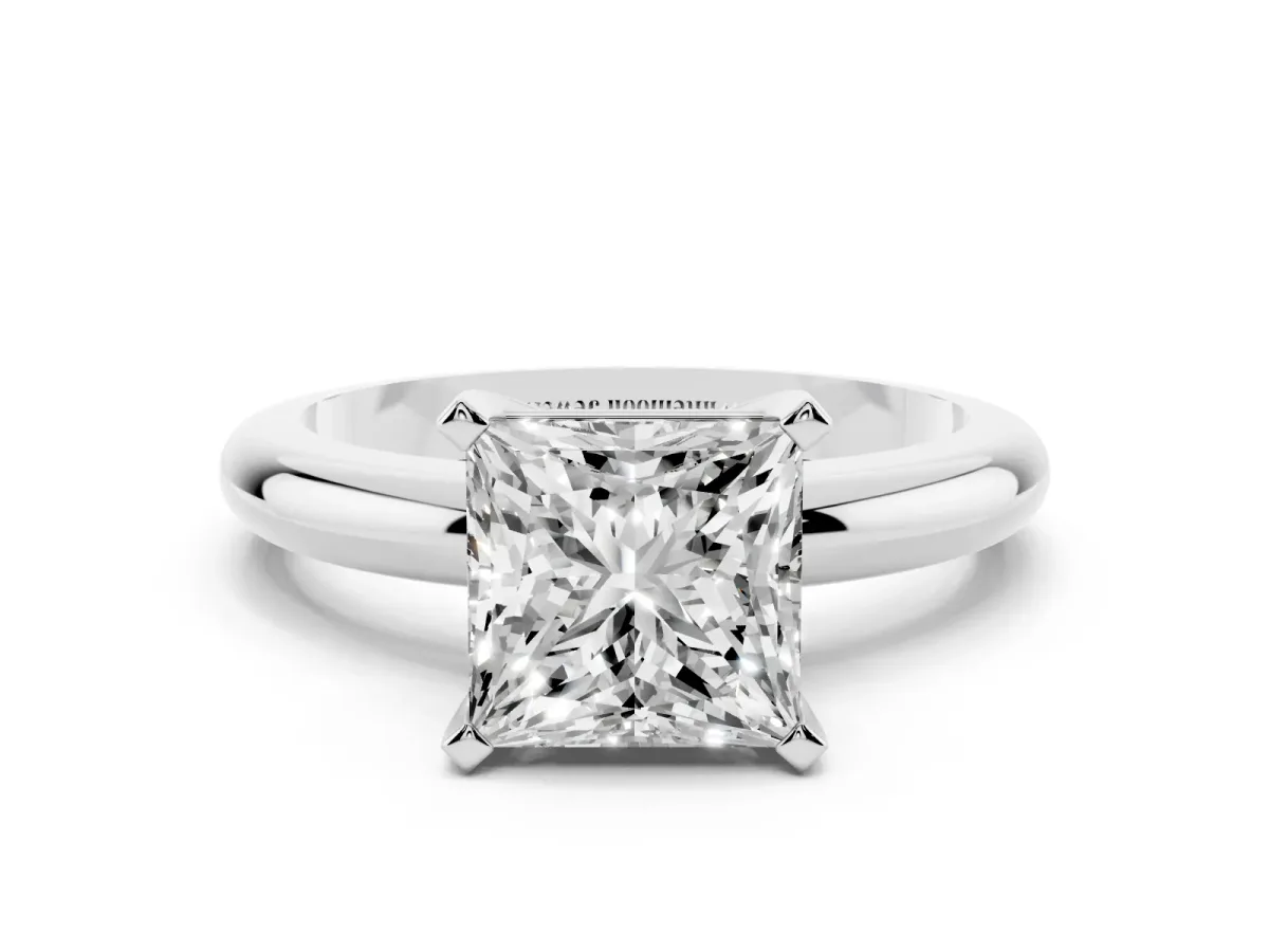 Princess Cut Diamond Solitaire Engagement Ring with Round Band and Four-Prong Setting Silver