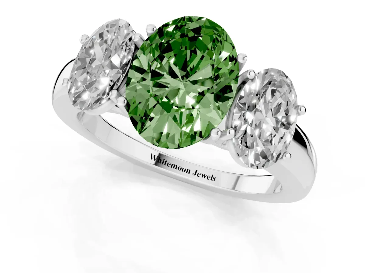Fancy Green Oval Cut Diamond Three-Stone Ring with Four-Prong Setting and Classic Band Platinum
