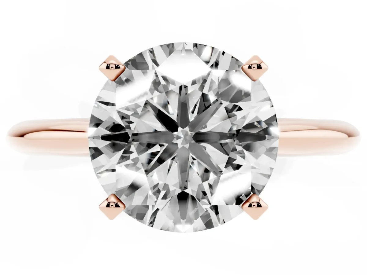 Round Cut Cut Solitaire Ring with Four-Prong Setting on a Classic Band Rose gold