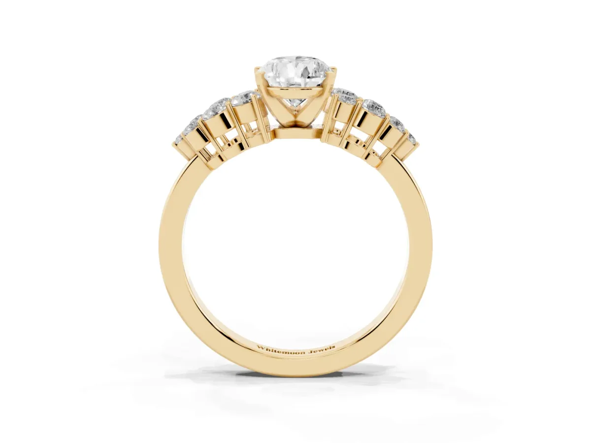 Pear Cut Cluster Diamond Engagement Ring with Pavé Band and Four-Prong Setting Yellow gold