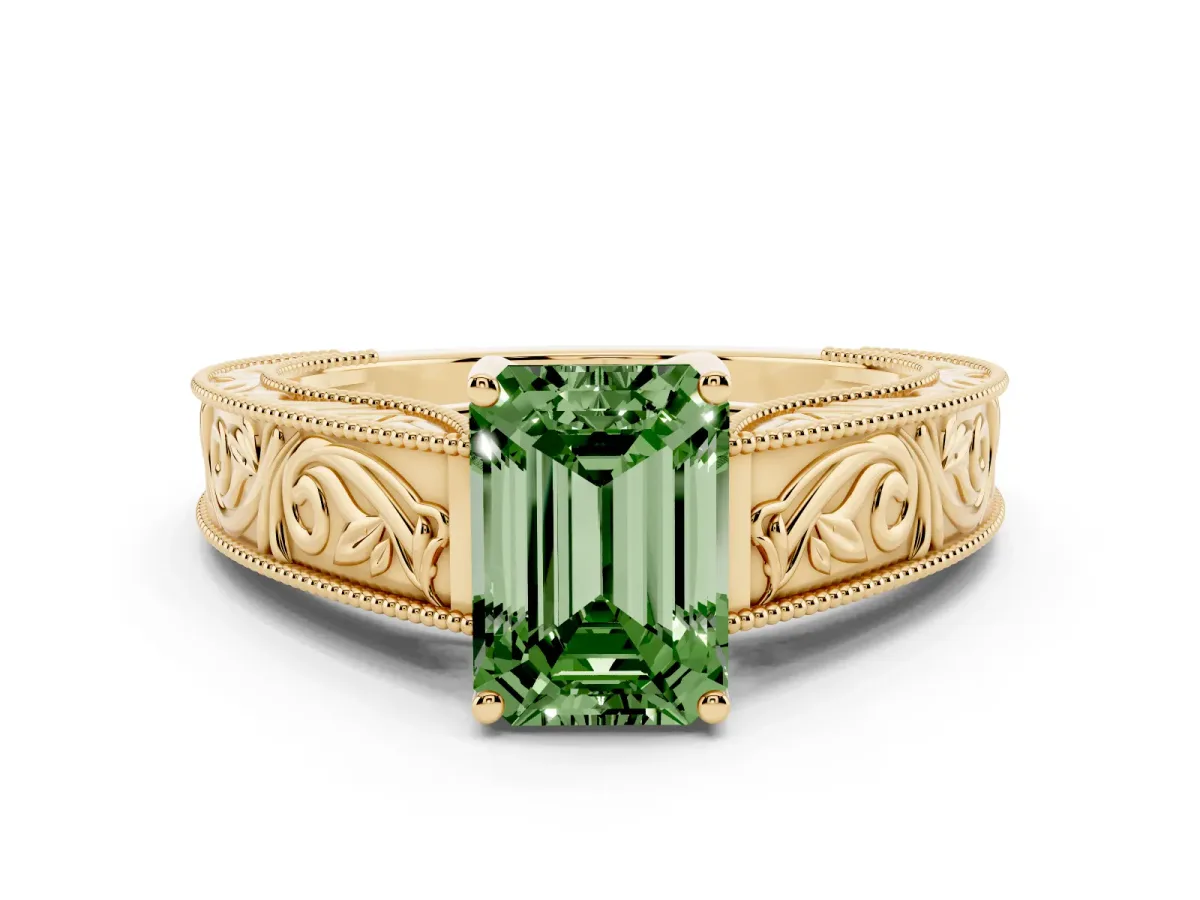Fancy Green Emerald Cut Diamond Solitaire Ring with Engraved Band and Four-Prong Setting Yellow gold