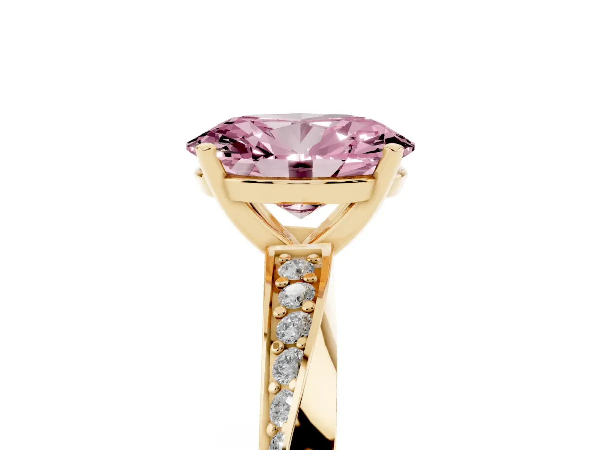Fancy Pink Oval Cut Diamond Engagement Ring with Side Stone Accents and Four-Prong Setting Yellow gold