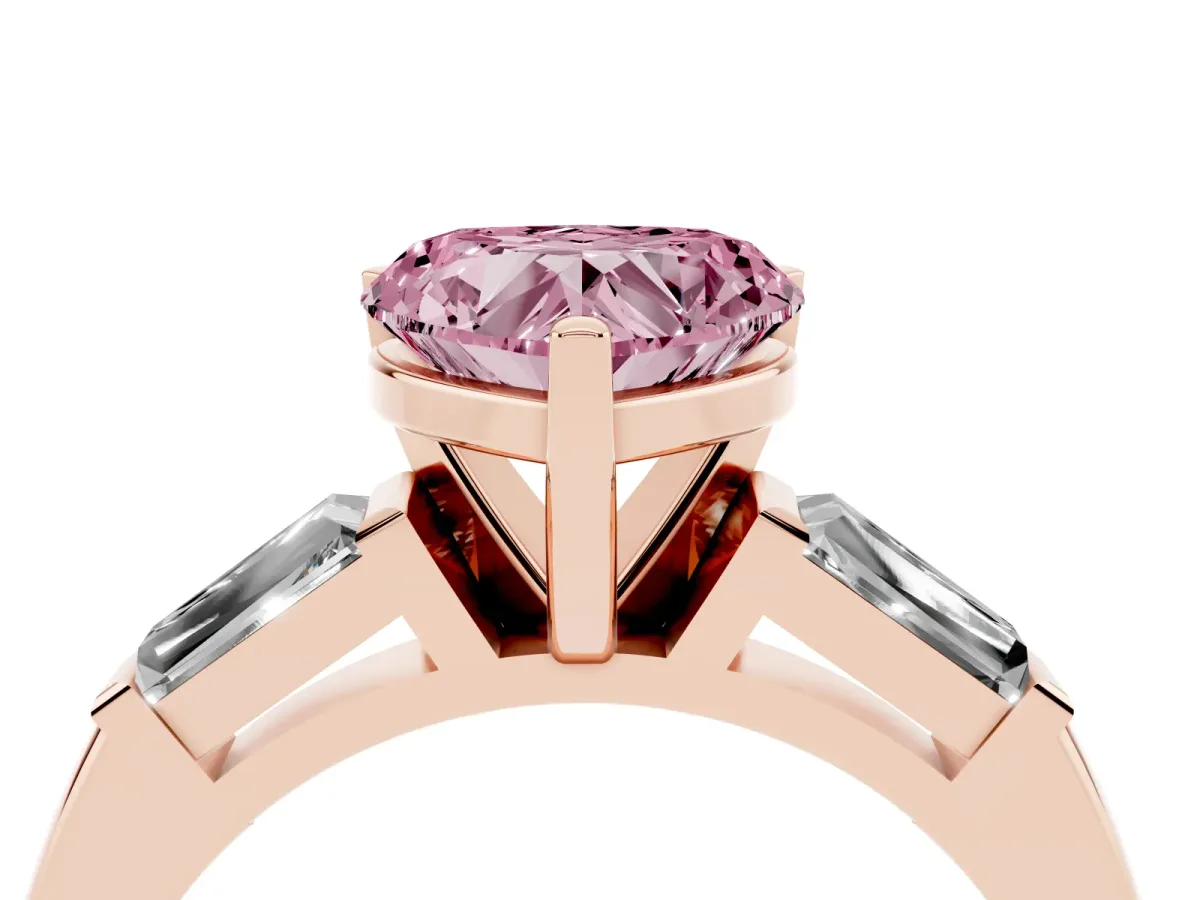 Fancy Pink Heart Cut Solitaire with Tapered Baguette Side Stones on a Classic Band with Four-Prong Setting Rose gold