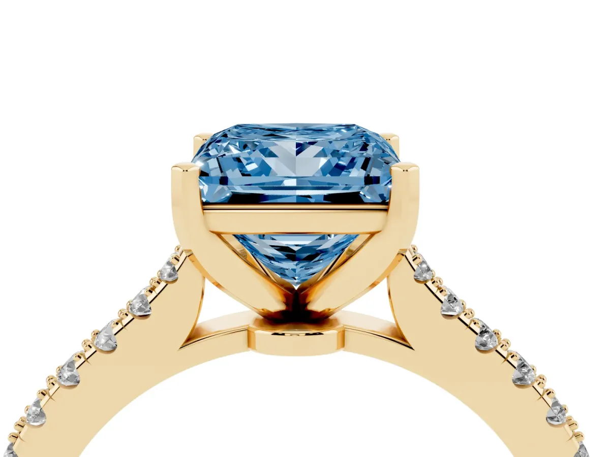 Fancy Blue Princess Cut Cut Solitaire Diamond Engagement Ring with Pave Band and Four-Prong Setting Yellow gold