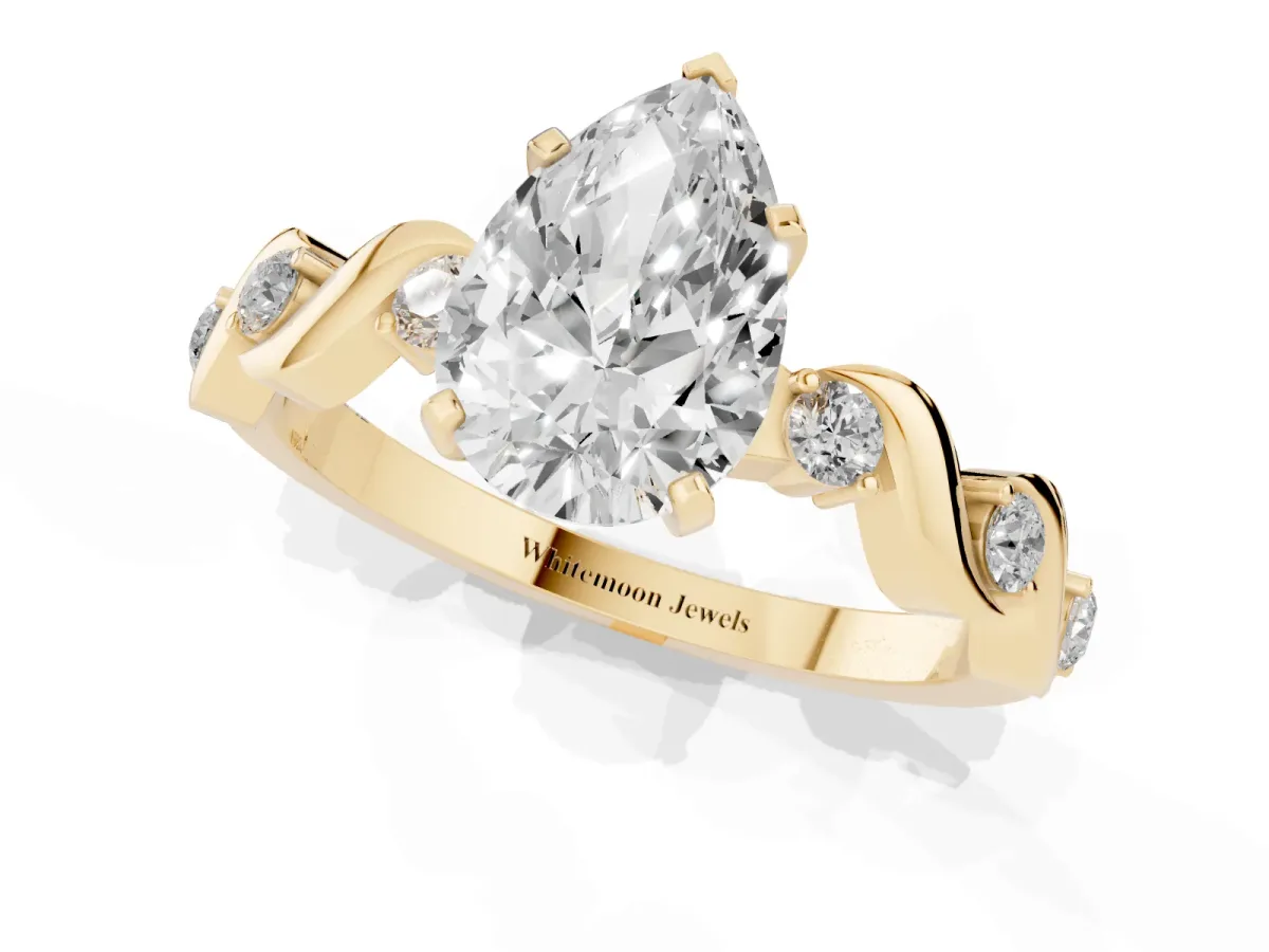 Pear Cut Diamond Solitaire Twisted Band with Round Accents and Prong Setting Yellow gold