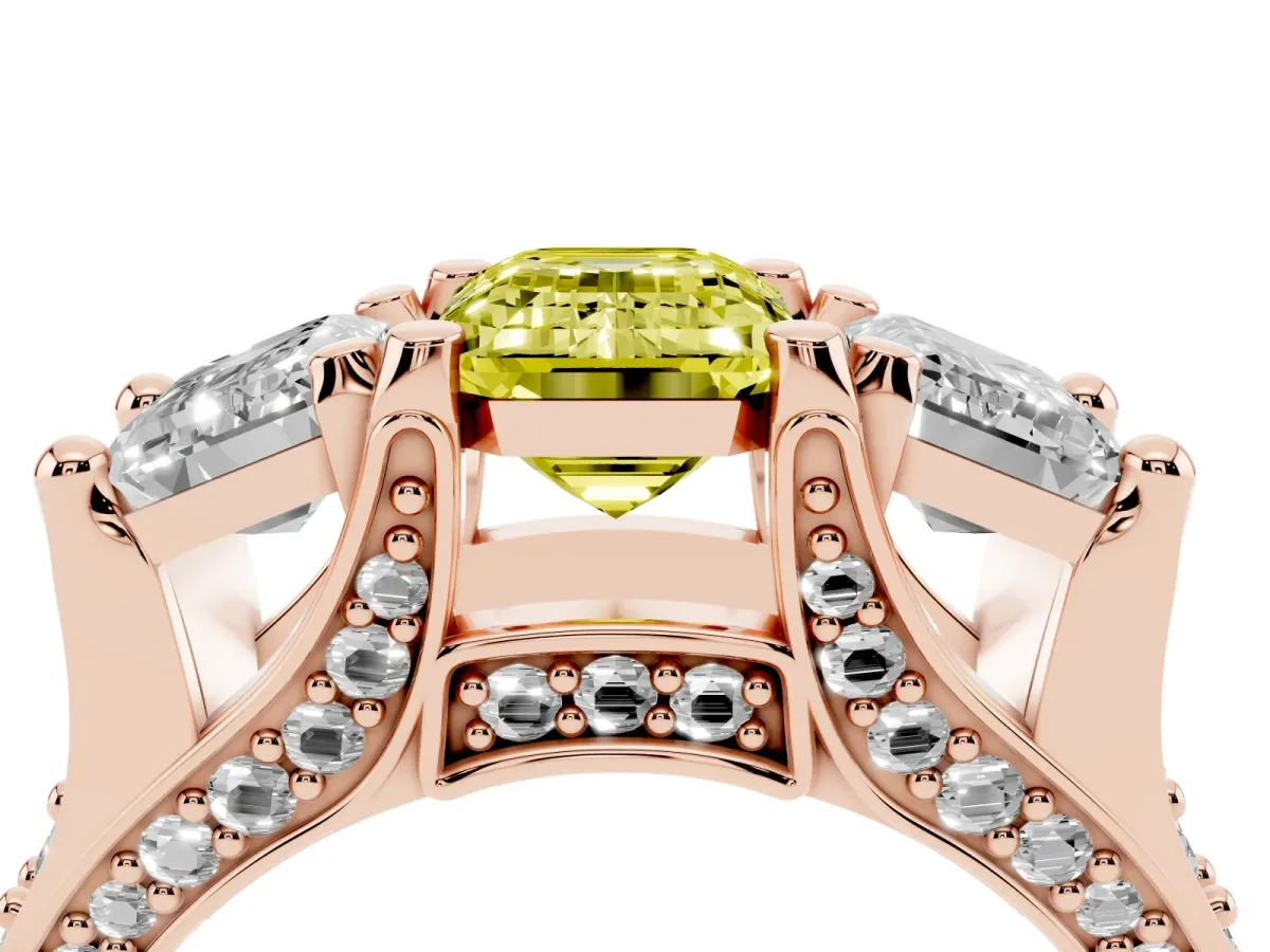 Fancy Yellow Emerald Cut Diamond Three-Stone Ring with Channel Set Band and Four-Prong Setting Rose gold