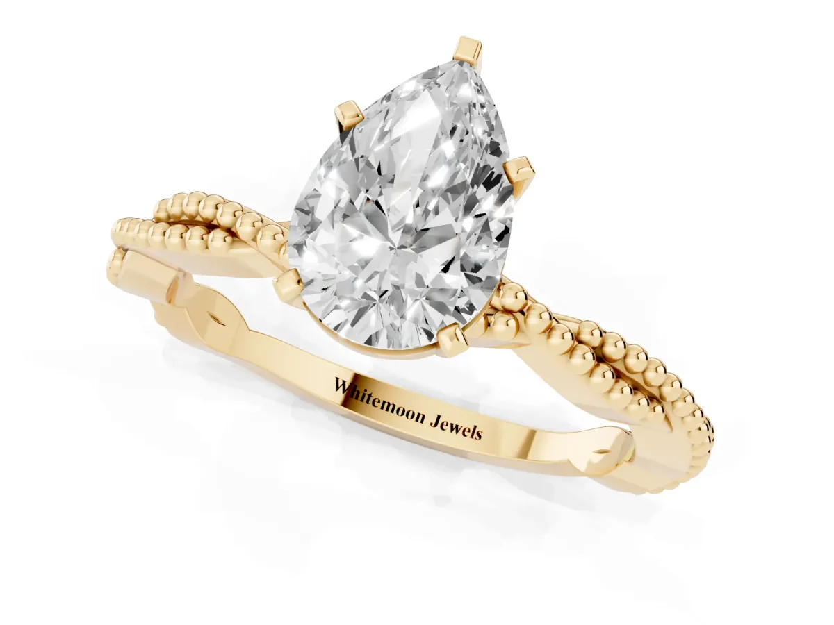 Pear Cut Solitaire Twisted Band with Bead Prong Setting Yellow gold