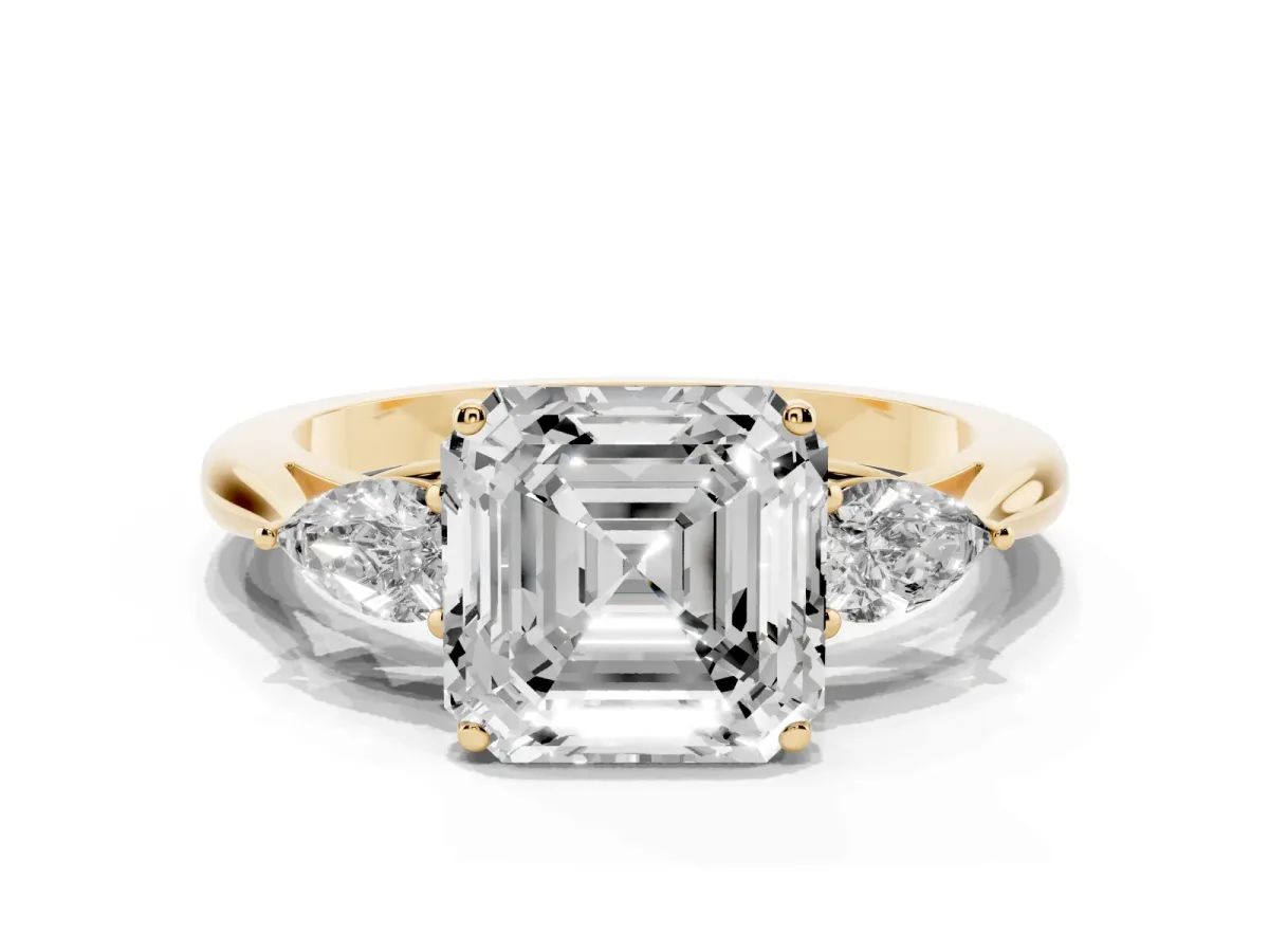 Three-Stone Asscher Cut Brilliant Diamond Solitaire Ring with Tapered Band and Four-Prong Setting Yellow gold
