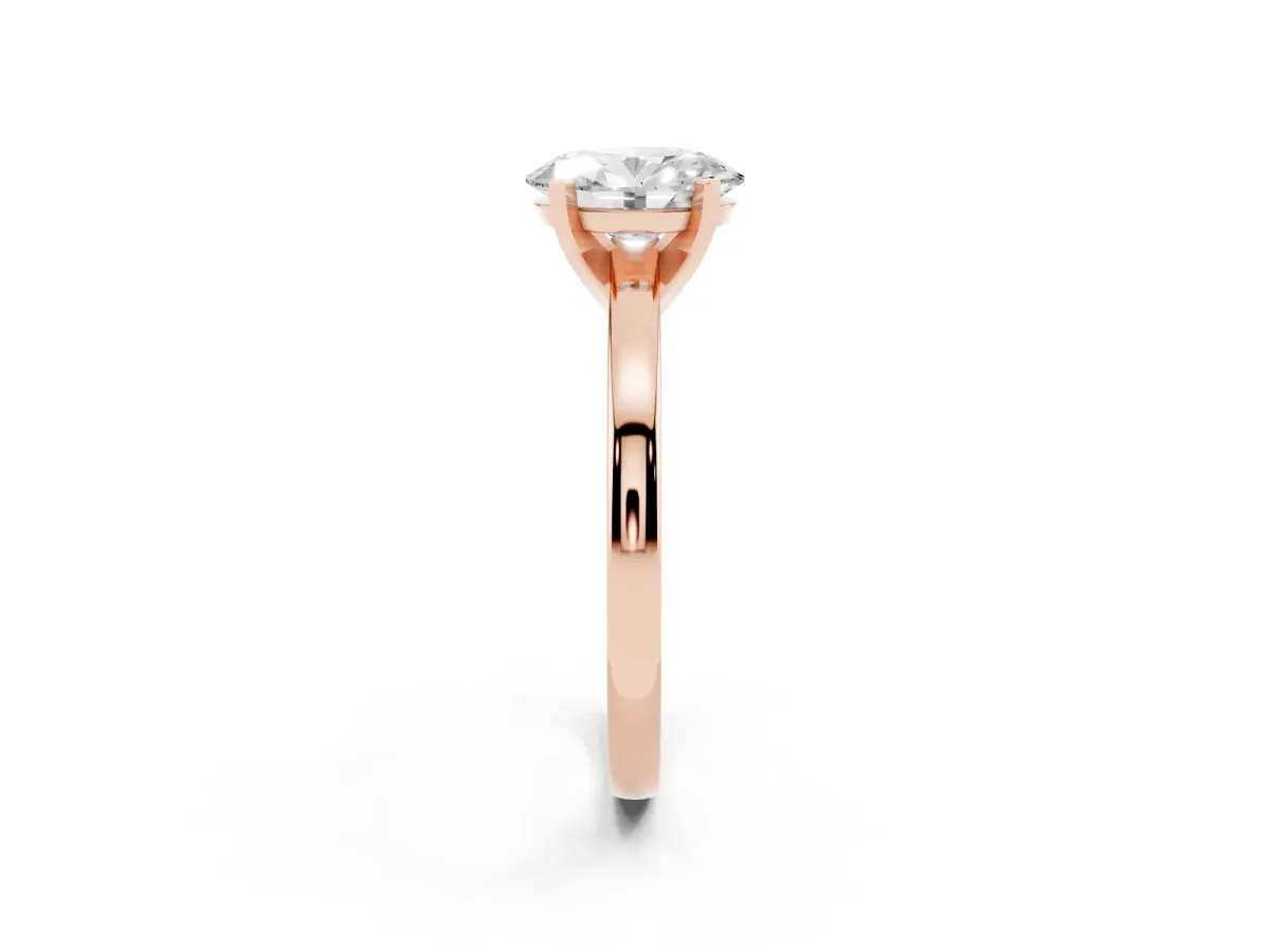 Oval Cut Solitaire Diamond Engagement Ring with Four-Prong Setting on a Classic Band Rose gold