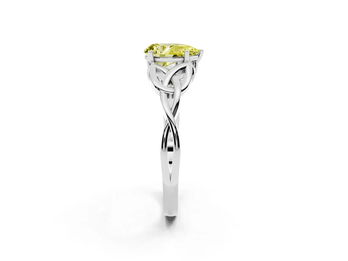 Fancy Yellow Pear Cut Diamond Solitaire Engagement Ring with Celtic Knot Band and Four-Prong Setting Silver
