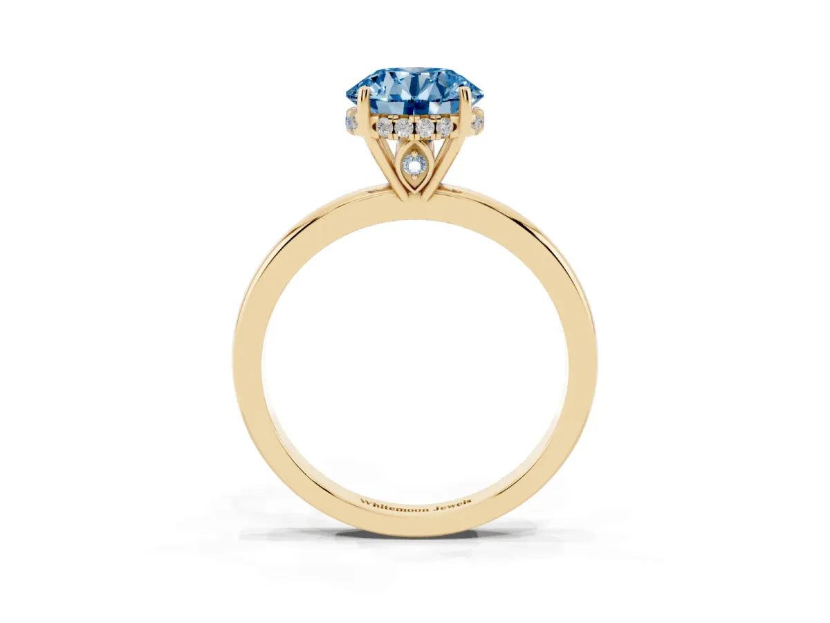 Fancy Blue Round Cut Solitaire Diamond Ring with Prong Setting and Plain Band Yellow gold