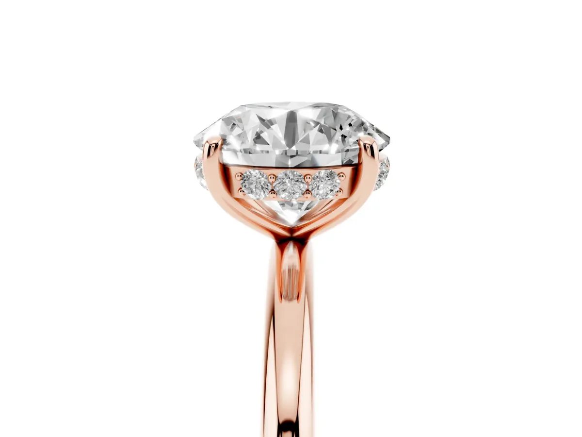 Round Cut Solitaire Diamond Ring with a Classic Band and Four-Prong Setting Rose gold