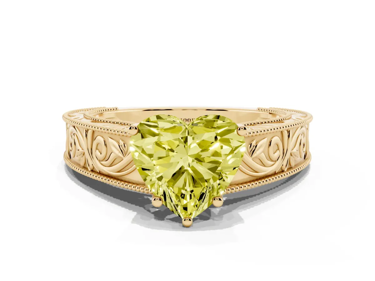 Fancy Yellow Heart Cut Diamond Solitaire Ring with Engraved Band and Four-Prong Setting Yellow gold