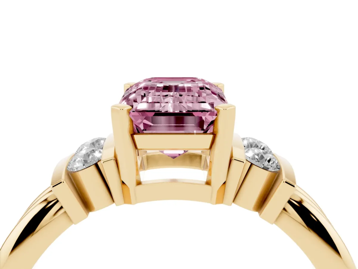 Fancy Pink Emerald Cut Cut Three-Stone Channel Set Ring with Bar Prongs Yellow gold