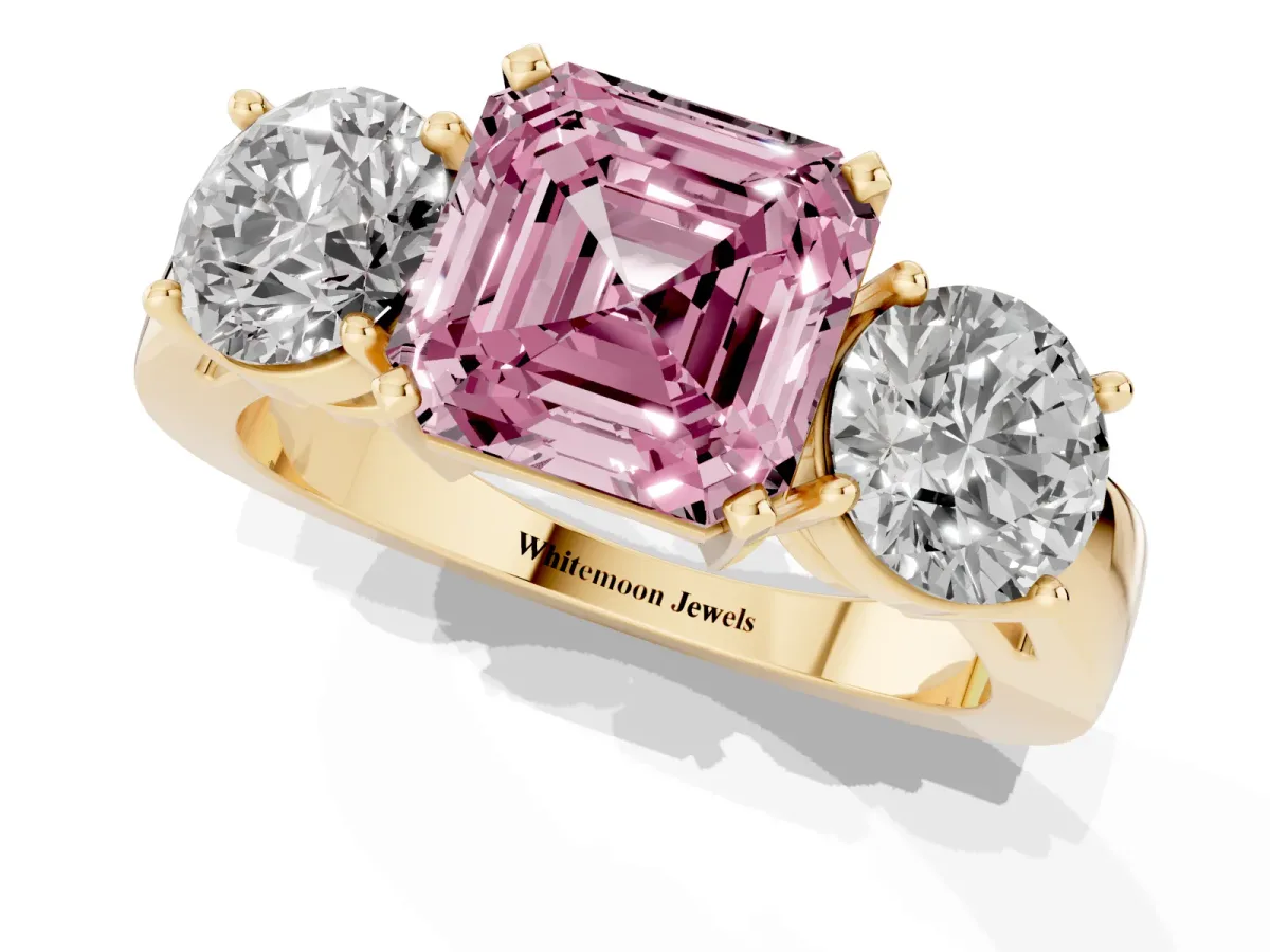 Fancy Pink Three-Stone Asscher Cut Diamond Ring with Round Side Stones, Classic Band, and Four-Prong Setting Yellow gold