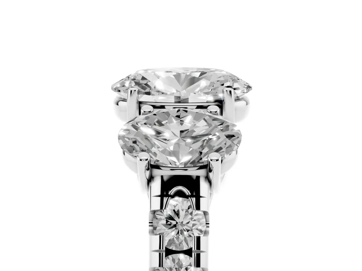 Three-Stone Oval Cut Diamond Pavé Band with Prong Setting Platinum