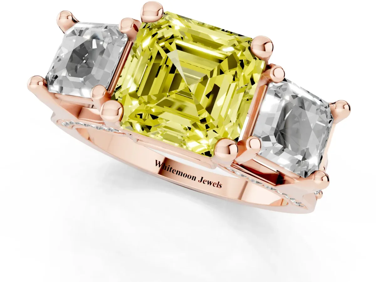 Fancy Yellow Asscher Cut Diamond Three-Stone Ring with Channel Set Band and Four-Prong Setting Rose gold