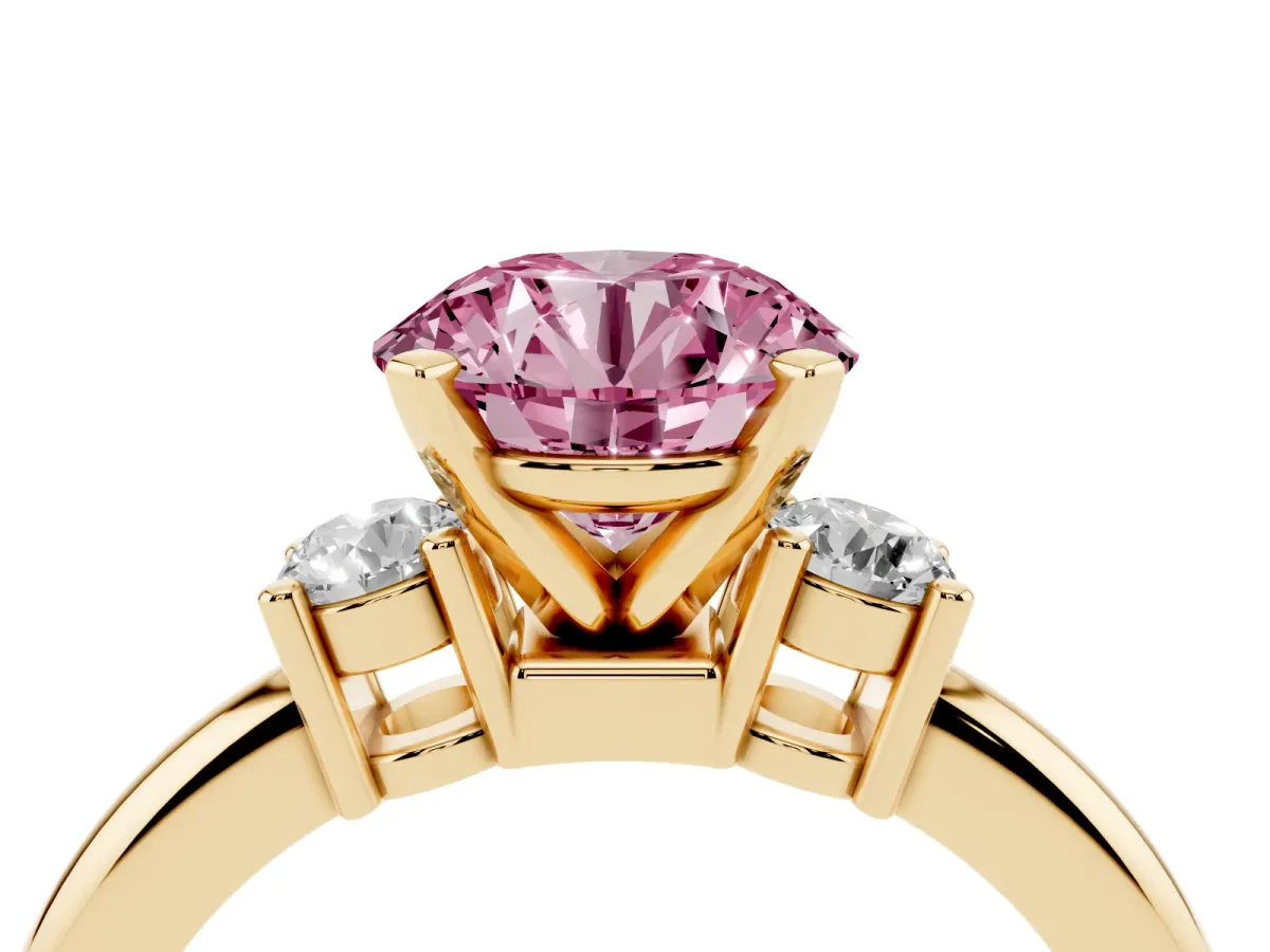 Fancy Pink Three-Stone Round Cut Cut Diamond Solitaire with Prong Setting and Classic Band Yellow gold