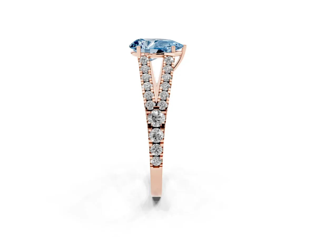 Fancy Blue Pear Cut Diamond Split Shank Pavé Engagement Ring with Four-Prong Setting Rose gold
