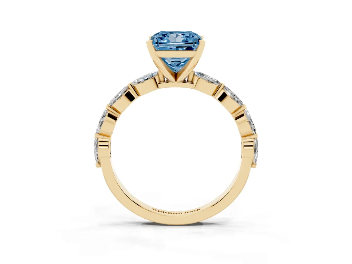 Fancy Blue Princess Cut Diamond Ring with Marquise Side Stones and Prong Setting Yellow gold