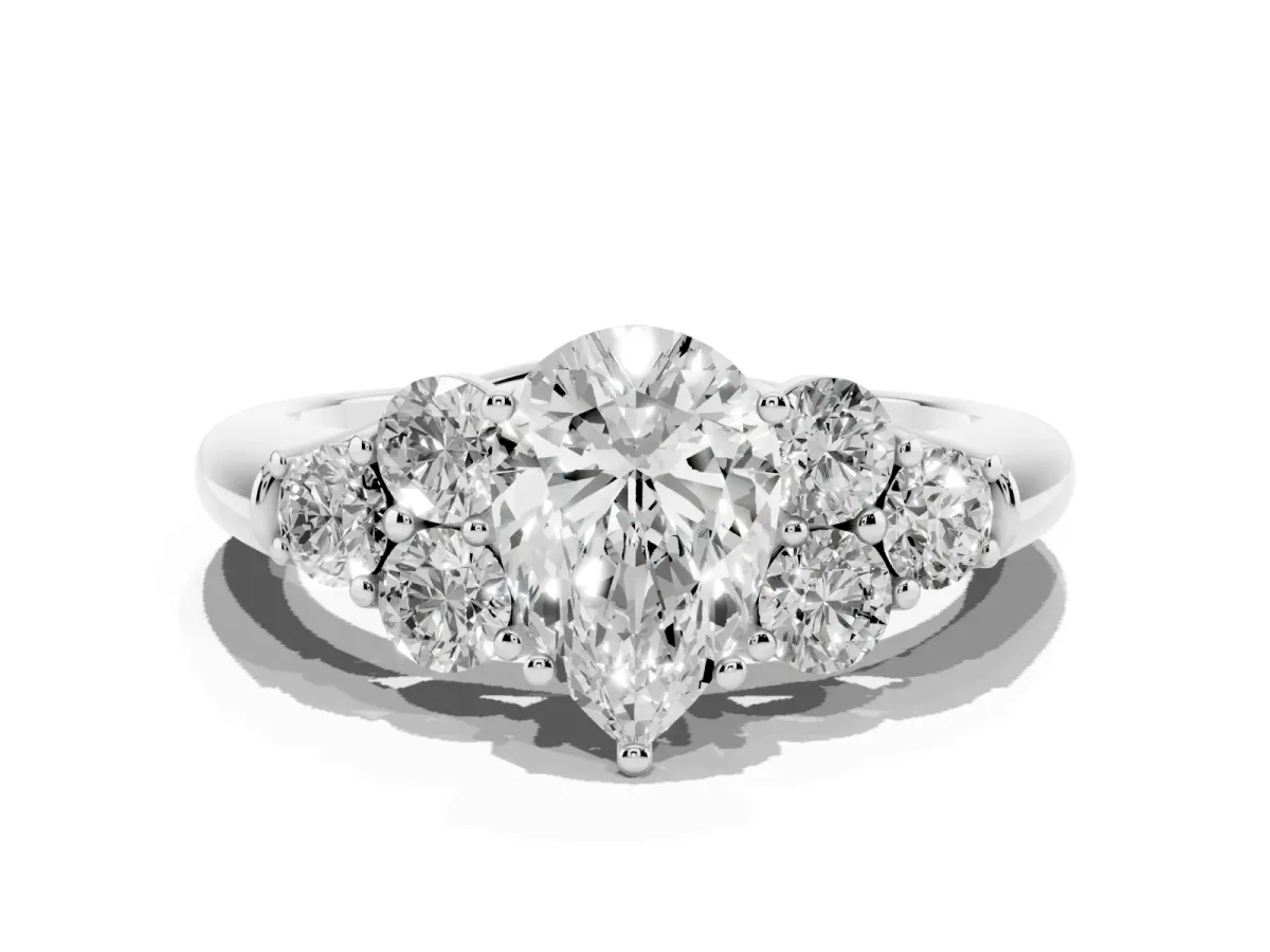 Pear Cut Cut Diamond Cluster Ring with Round Accent Stones and Prong Setting on a Classic Band White gold