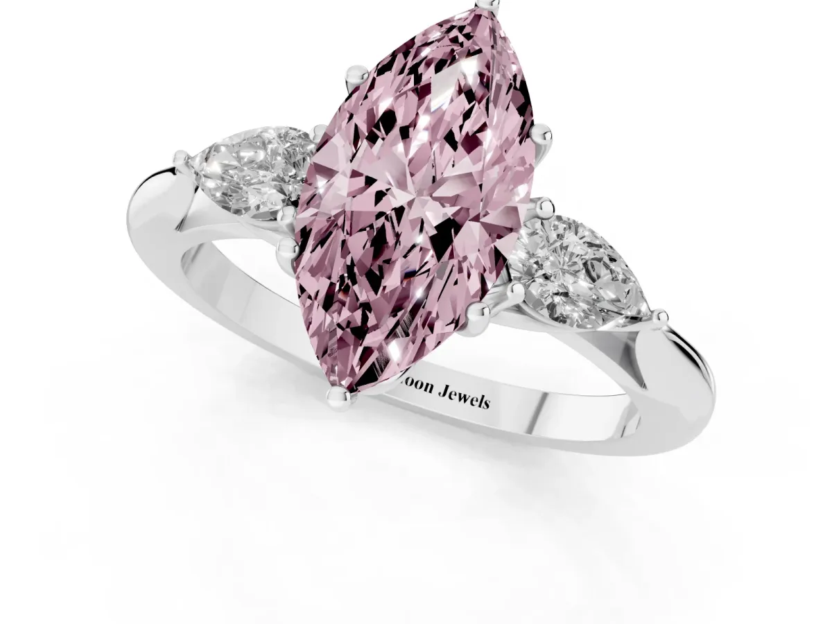 Fancy Pink Three-Stone Marquise Cut Diamond Ring with Pear Side Stones in Four-Prong Setting Silver