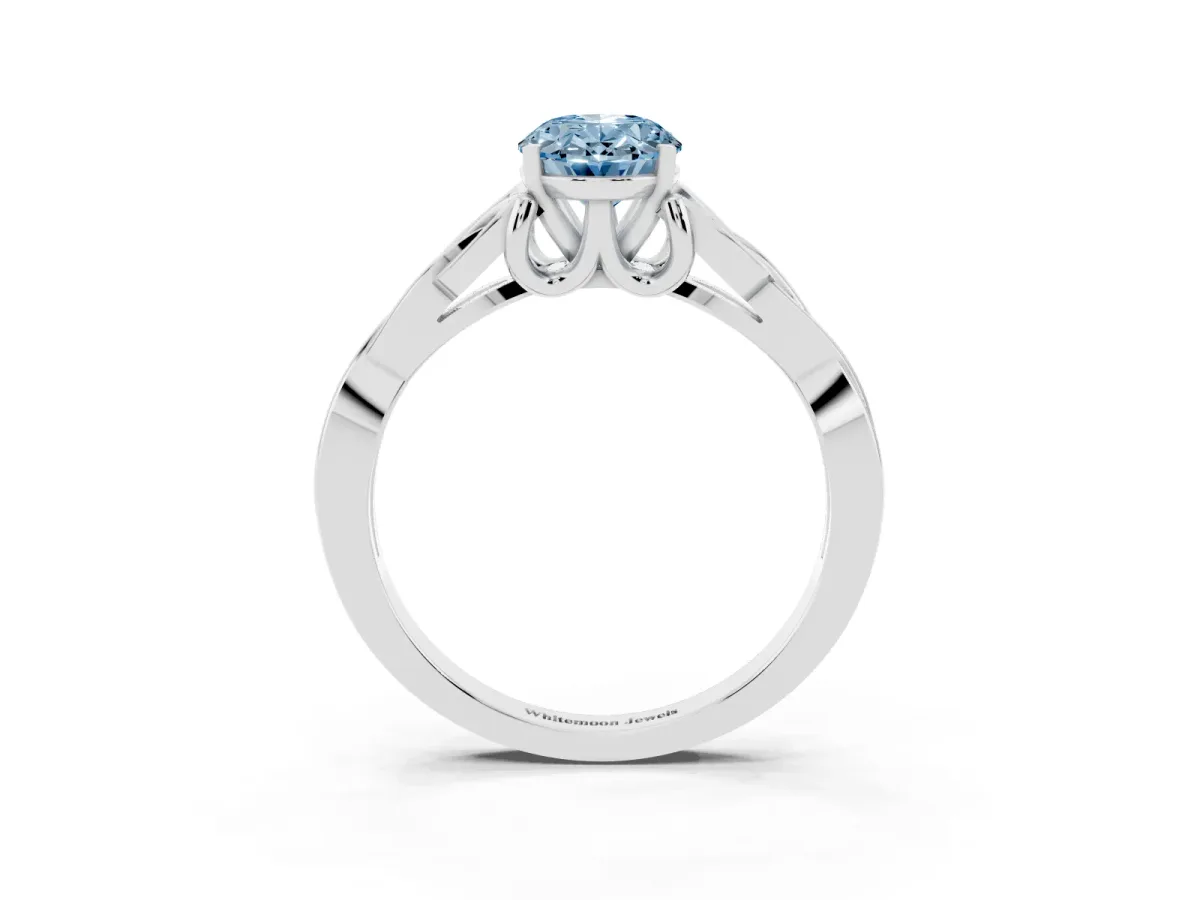 Fancy Blue Oval Cut Diamond Solitaire Engagement Ring with Celtic Knot Band and Four-Prong Setting Silver
