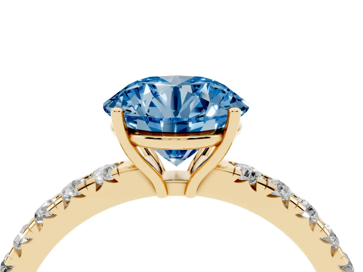 Fancy Blue Round Cut Diamond Pavé Solitaire Engagement Ring with Four-Prong Setting Yellow gold