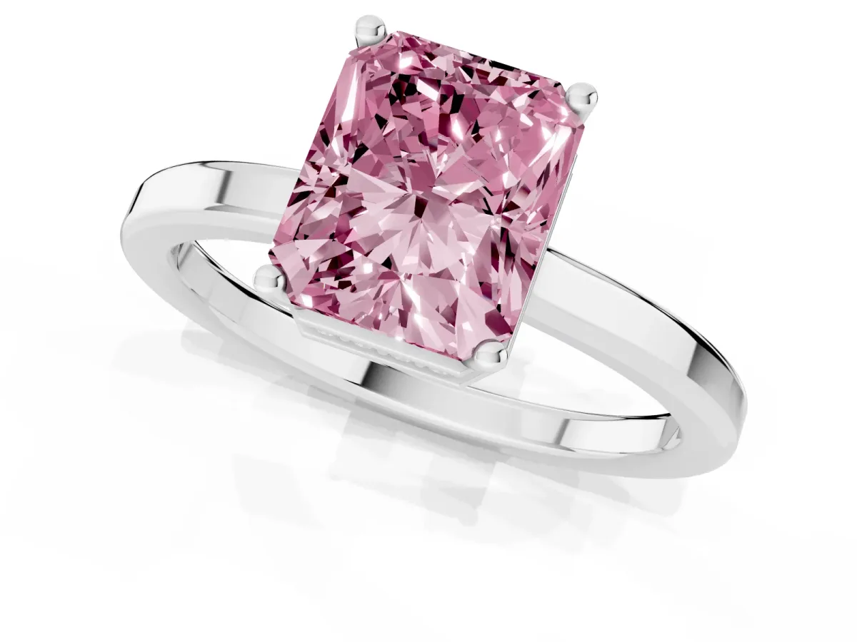Fancy Pink Radiant Cut Cut Solitaire Engagement Ring with Four-Prong Setting on a Classic Band Silver