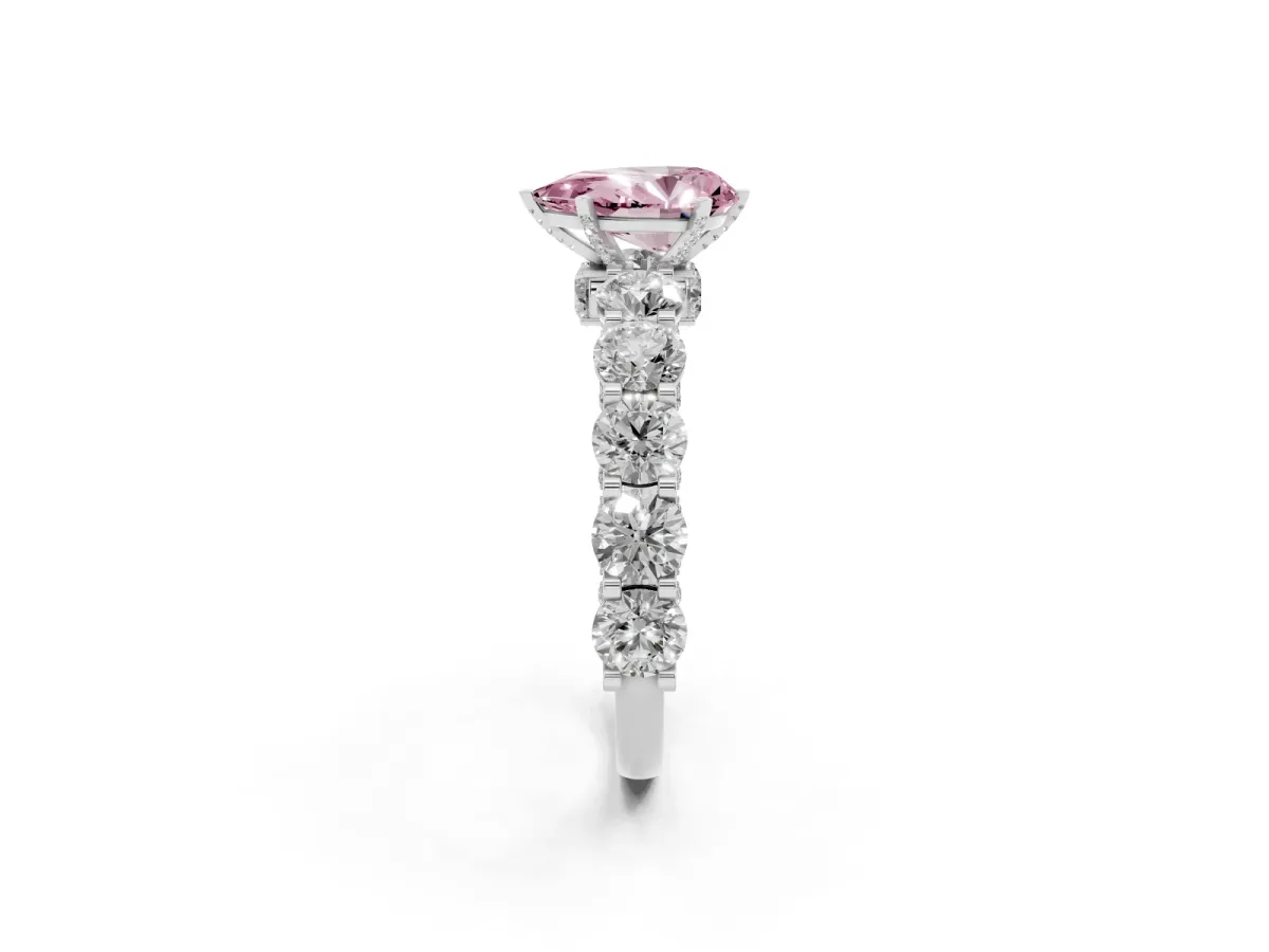 Fancy Pink Pear Cut Diamond Side Stone Engagement Ring with Four-Prong Setting Platinum