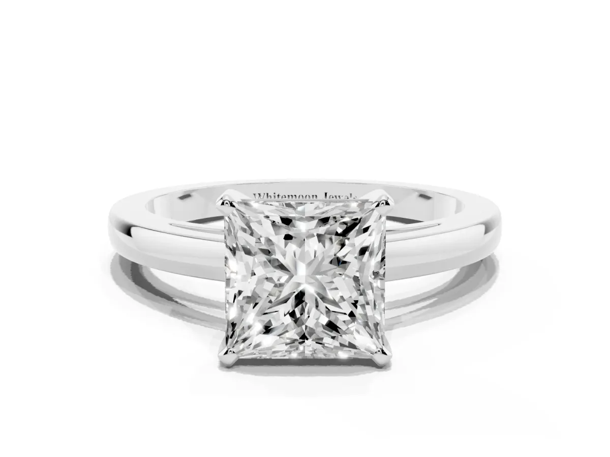 Princess Cut Solitaire Diamond Engagement Ring with Four-Prong Setting on a Classic Band Silver